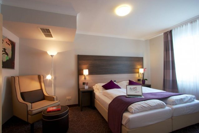 Slaapkamer voor twee personen in cityhotel Arion Vienna in Wenen